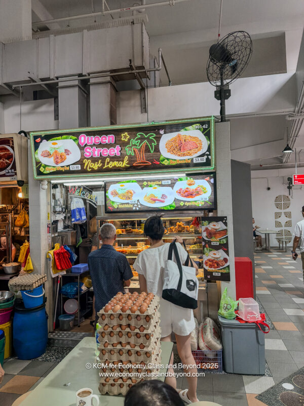 people standing in a food store