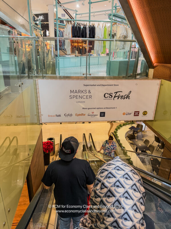 a man on an escalator