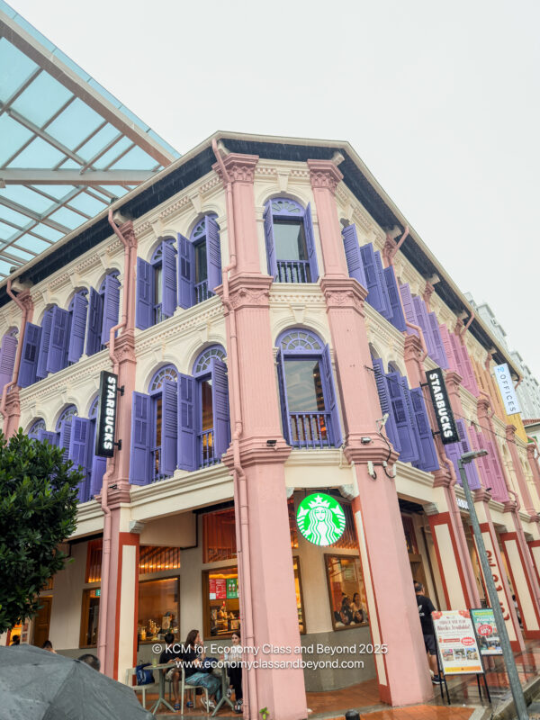 a building with purple shutters