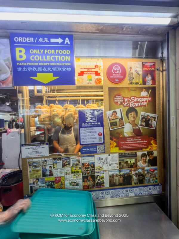 a food stand with signs and posters