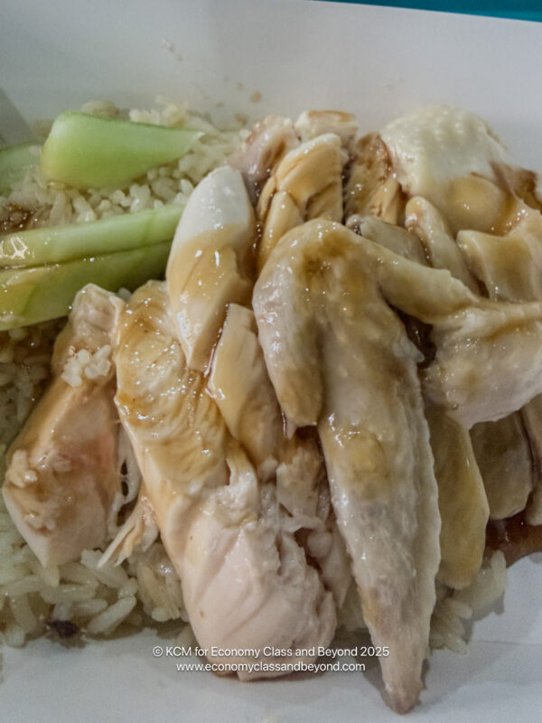 a plate of food with rice and meat