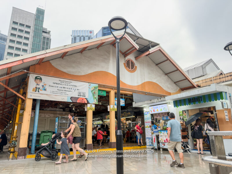 a group of people walking in a market