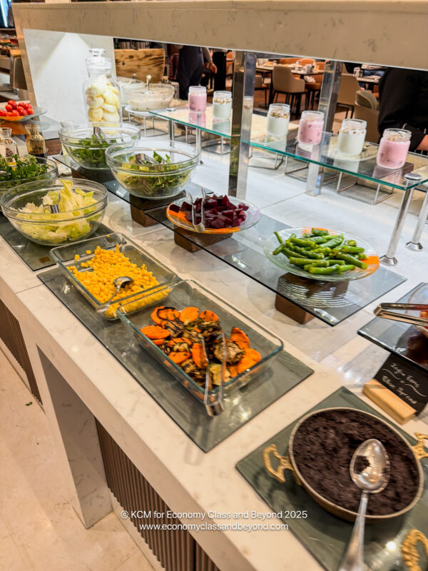 a buffet table with different food items on it