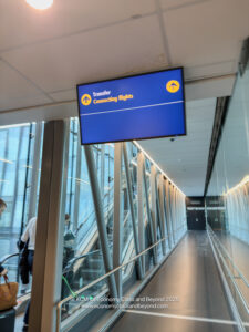 a blue sign in a hallway