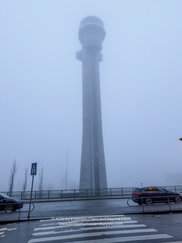 a tall tower in fog