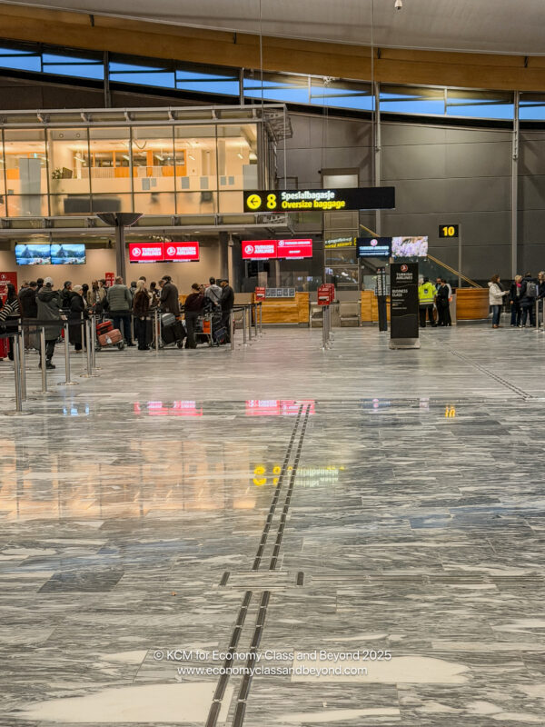 a group of people in a large airport