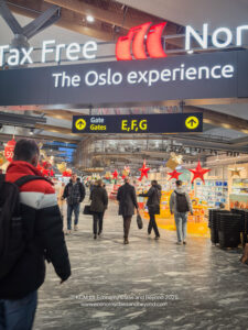 a group of people walking in a shopping mall