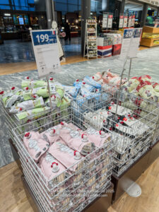 a shopping cart with bags of food in it