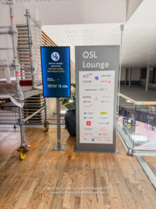 a sign next to a sign