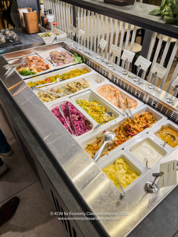 a buffet with different food in containers
