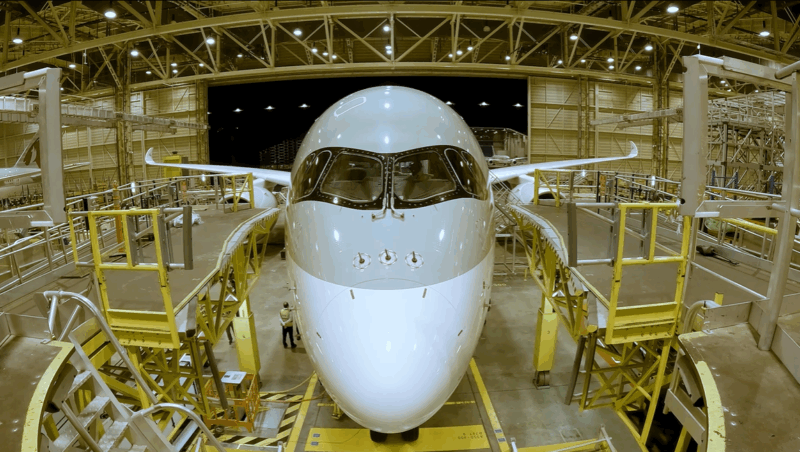 Qatar Airways 787 in a hanger being pushed back - Image, Qatar Airways
