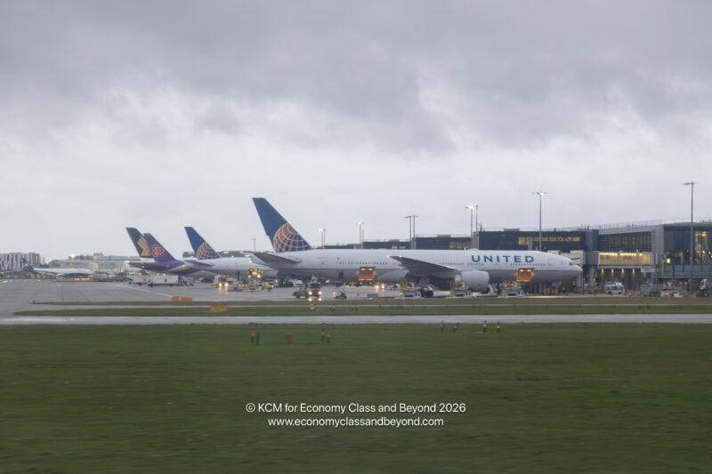 United Airlines Boeing 777-200ER unloading at London Heathrow Terminal 1 - Image, Economy Class and Beyond