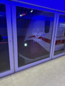 a glass door with a logo on it