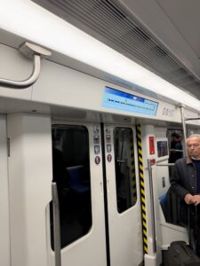 a man standing on a train