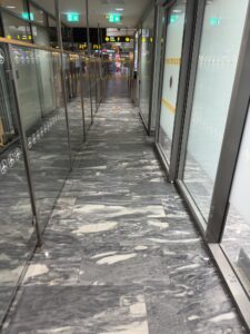 a hallway with glass doors