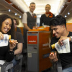 EasyJet serving free sausage rolls and limited-edition ‘Destination Dips’ on the plane as the airline and tour operator team up with Greggs to celebrate the launch of its new Newcastle base. Issue date: Monday March 23, 2026. PA Photo. The partnership introduces five sausage roll dipping sauces inspired by new easyJet holidays destinations including Sangria, Affogato, Harissa Ketchup, Tarte Tatin, and Kebab, offered across all international easyJet flights from Newcastle Airport today and across the city. Image, Easyjet David Parry/PA Media Assignments