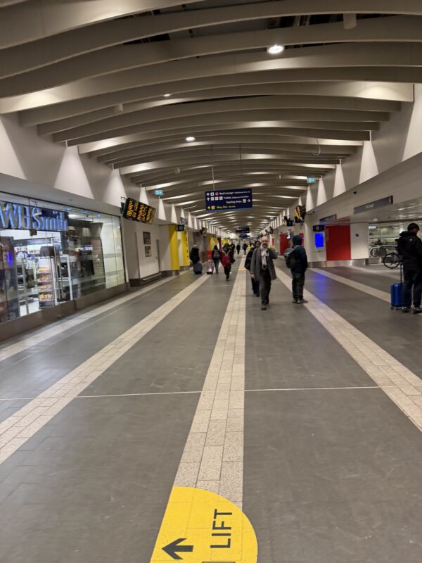 people walking in a building