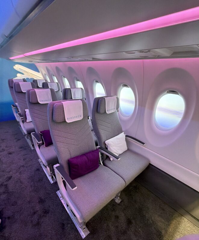 Airbus A220 mockup - 32" and 28" seating