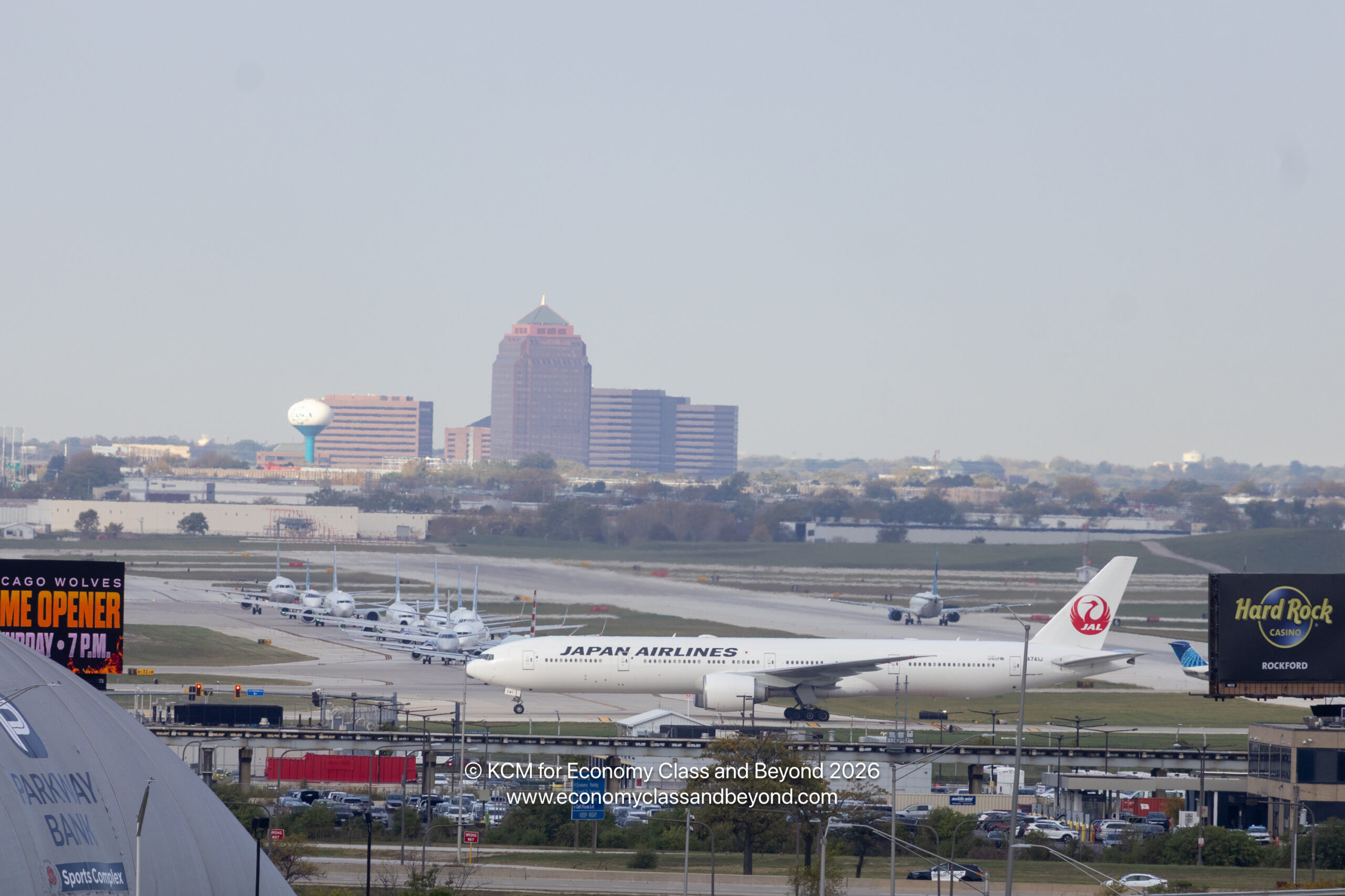 boardingarea.com - Kevincm - Airplane Art - Japan Airlines Boeing 777-300ER taxiing at Chicago O'Hare - Economy Class & Beyond