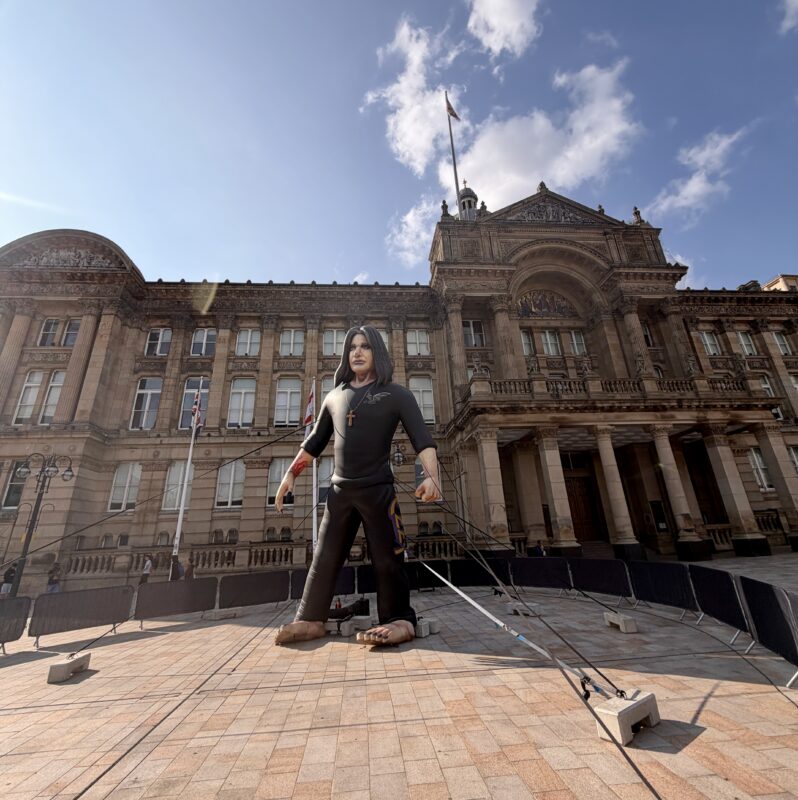 Ozzy Ozbourne in front of Birmingham Council House - Image, Economy Class and Beyond